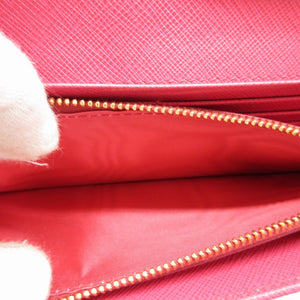 未使用 プラダ 1MH132 サフィアーノレザー ピンク 2つ折り長財布 財布 0024【中古】PRADA